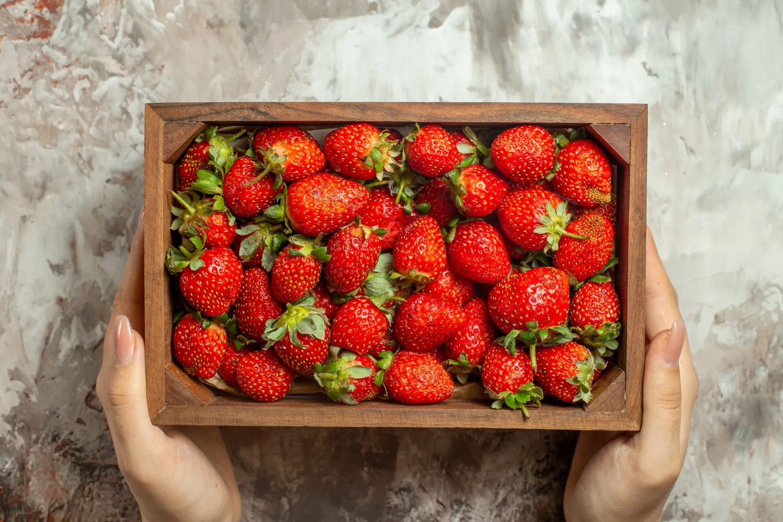 Fresh Egyptian strawberries in a wooden export box